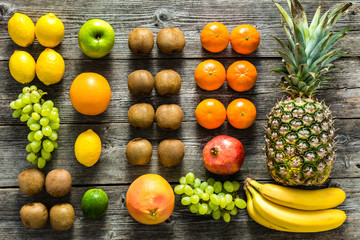 Tropical fruit mix on table. Fruits as healthy clean eating and dieting concept.