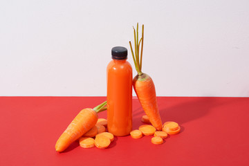 Fresh natural carrot juice on table. Healthy drink.