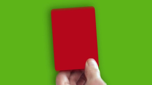 Hand shows red card on green screen