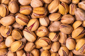 Pistachio texture. Nuts. Roasted salted pistachio nuts healthy delicious food studio photo.