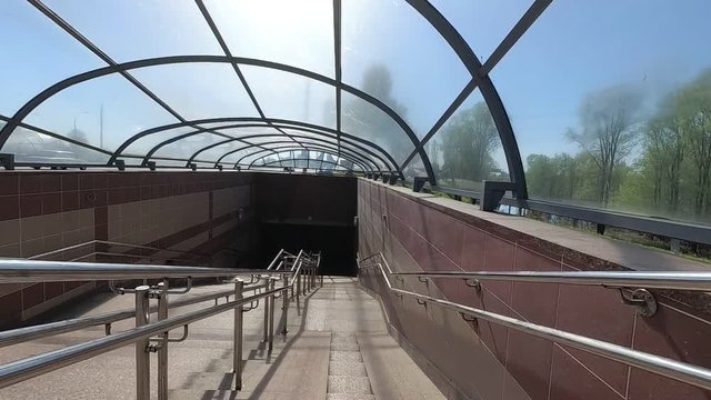 underground pedestrian crossing. barrier-free environment. metal railing.