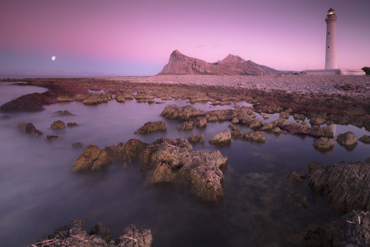 Lighthouse at sunset, San Vito Lo Capo, province of Trapani, Sicily, Mediterranean