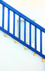 Staircase with blue railing in Myconos