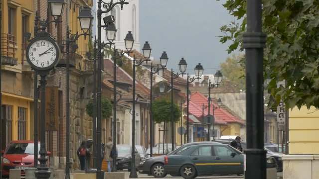 Street clock and lamp posts in Baia Mare