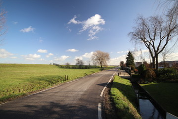 Fototapeta premium Wide angle view of polder Wilde Veenen at Donderdam between the villages of Moerkapelle and Waddinxveen in the Netherlands