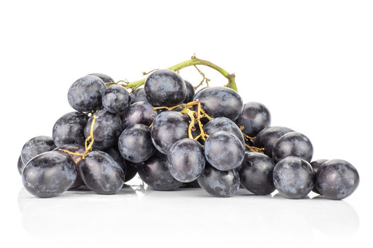 Black purple grape cluster (autumn royal variety) isolated on white background.