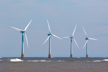 Wind turbines at sea Renewable energy offshore windfarm