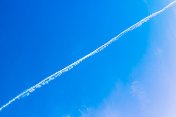 Blue sky with a trace from the airplane
