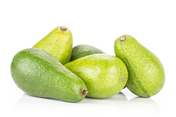 Green smooth avocado stack isolated on white background ripe shiny bacon variety.