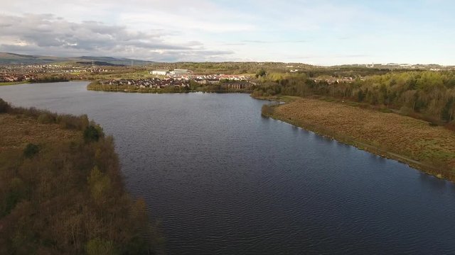 Aerial footage over Broadwood Loch at Cumbernauld near Glasgow.