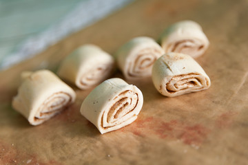 Preparing puff pastry cinnamon rolls
