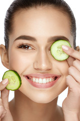 Beauty Face. Skin Care Treatment With Cucumber.