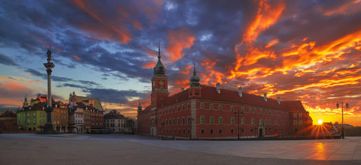 fiery sunrise over the Royal castle in Warsaw