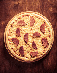 pepperoni pizza at wood