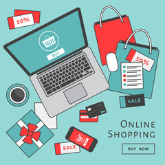 Online shopping concept. Online store objects and banner. Table with laptop, shopping bags, credit cards, gifts and coupons. Flat style, vector illustration.