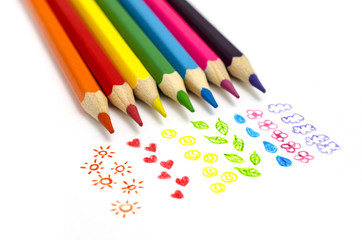 set of colored pencils with doodles isolated on white