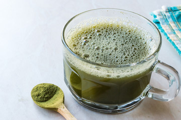 Hot Organic Green Matcha Tea in Glass.