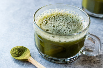 Hot Organic Green Matcha Tea in Glass.