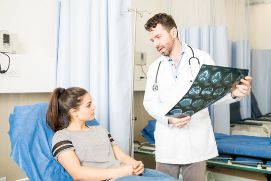 Radiologist discussing test results with patient