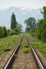 Straight railway and mountain