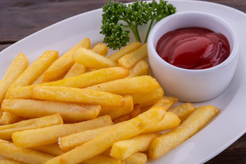 French fries the fried in sunflower oil with salt, hot sauce and parsley