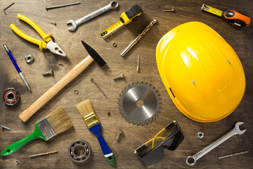 set of tools at wooden background