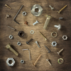 hardware tools and screws at wood