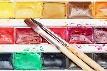Сhildren's paint box and brushes