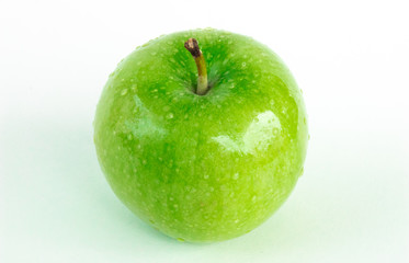 Perfect Fresh Green Apple Isolated on White Background with water drop in Full Depth of Field with Clipping Path.
