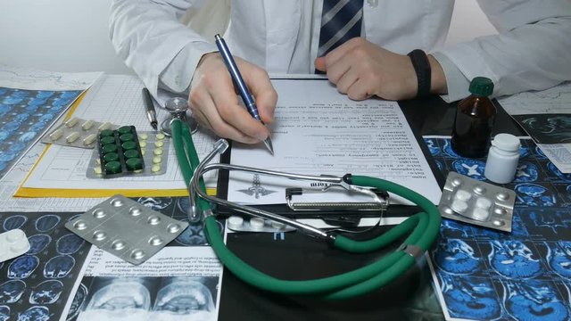 male doctor chooses pills