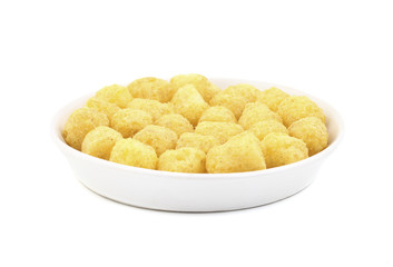 Tasty Round Shaped Yellow Snack Also Know as puffs, puffy Isolated on White Background