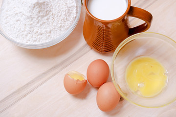 Wicker basket of eggs, heap