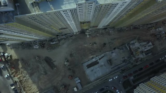Aerial view. Urban area in the metropolis. Construction of high-rise residential apartments in the city. View of the building site from above. Sale and rental of residential property