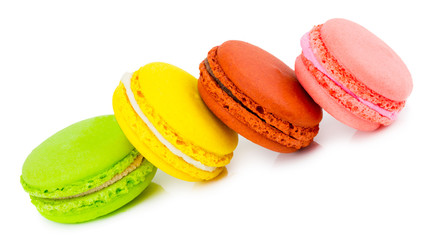 Macaron or macaroon on white background,. Colorful almond cookies on dessert top view
