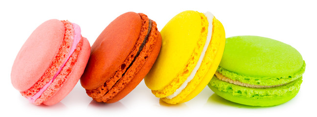 Macaron or macaroon on white background,. Colorful almond cookies on dessert top view