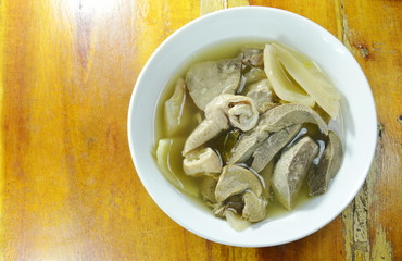 spicy boiled chicken with straw mushroom Tom Yum Soup on bowl