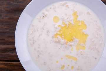Porridge, is served with butter for breakfast