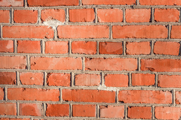 Obraz premium Detail of a red brick wall texture 