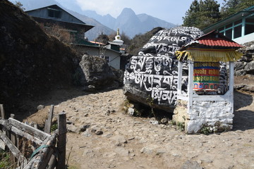 Mani stone and praying weel in Nachipang, Nepal
