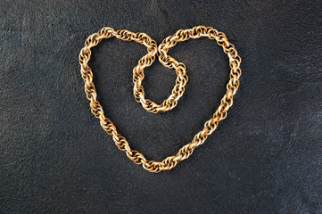 Vintage wooden necklace on black background
