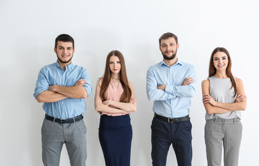 Obraz premium Young people standing together on white background. Unity concept