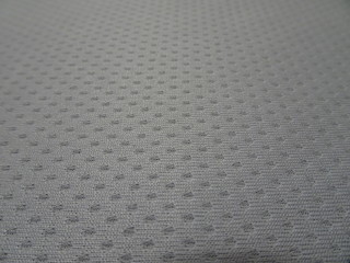 the texture of the original fabric of the natural neutral grey color