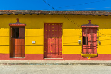 Yellow and red house in Baracoa, Cuba 