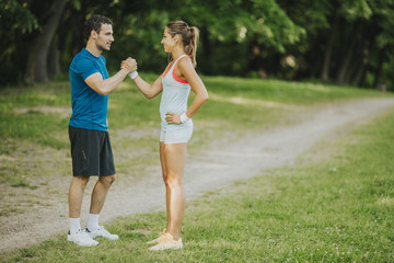 Young couple taking exercise