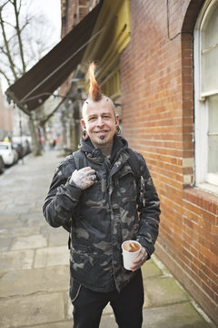 Portrait of a male punk with mohican hair