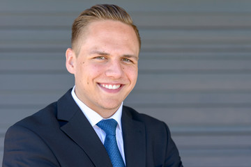 Happy businessman with a beaming smile