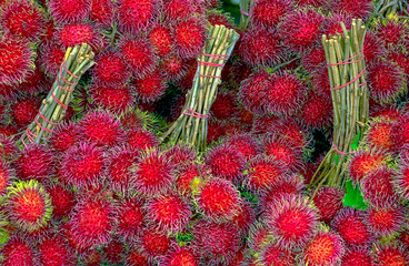 Fototapeta premium Rambutan fruit at a Thai market 