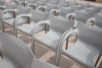 empty auditorium chairs outdoors