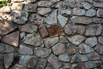 Close up of natural stone wall. Stone wall texture 