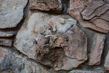 Close up of natural stone wall. Stone wall texture 